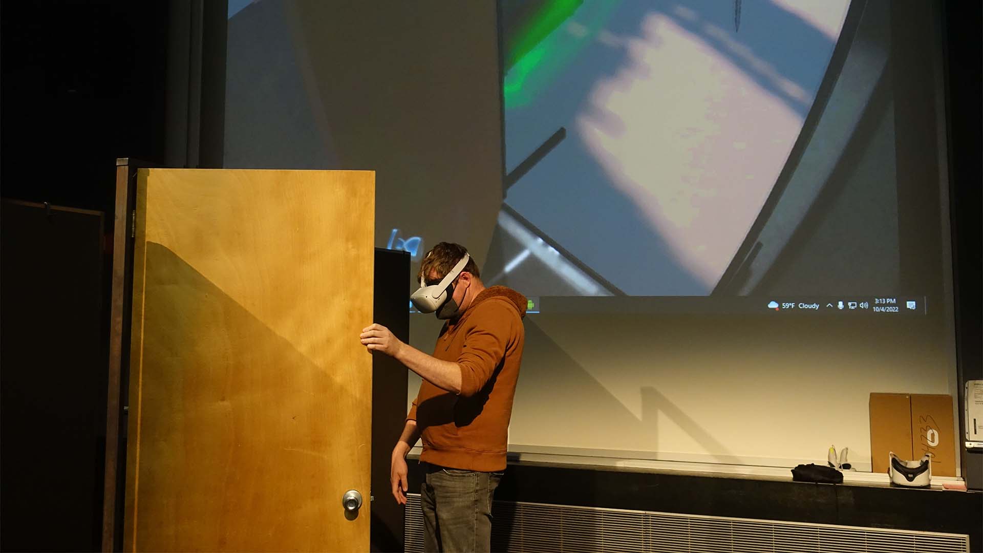 A player interacting with the real door